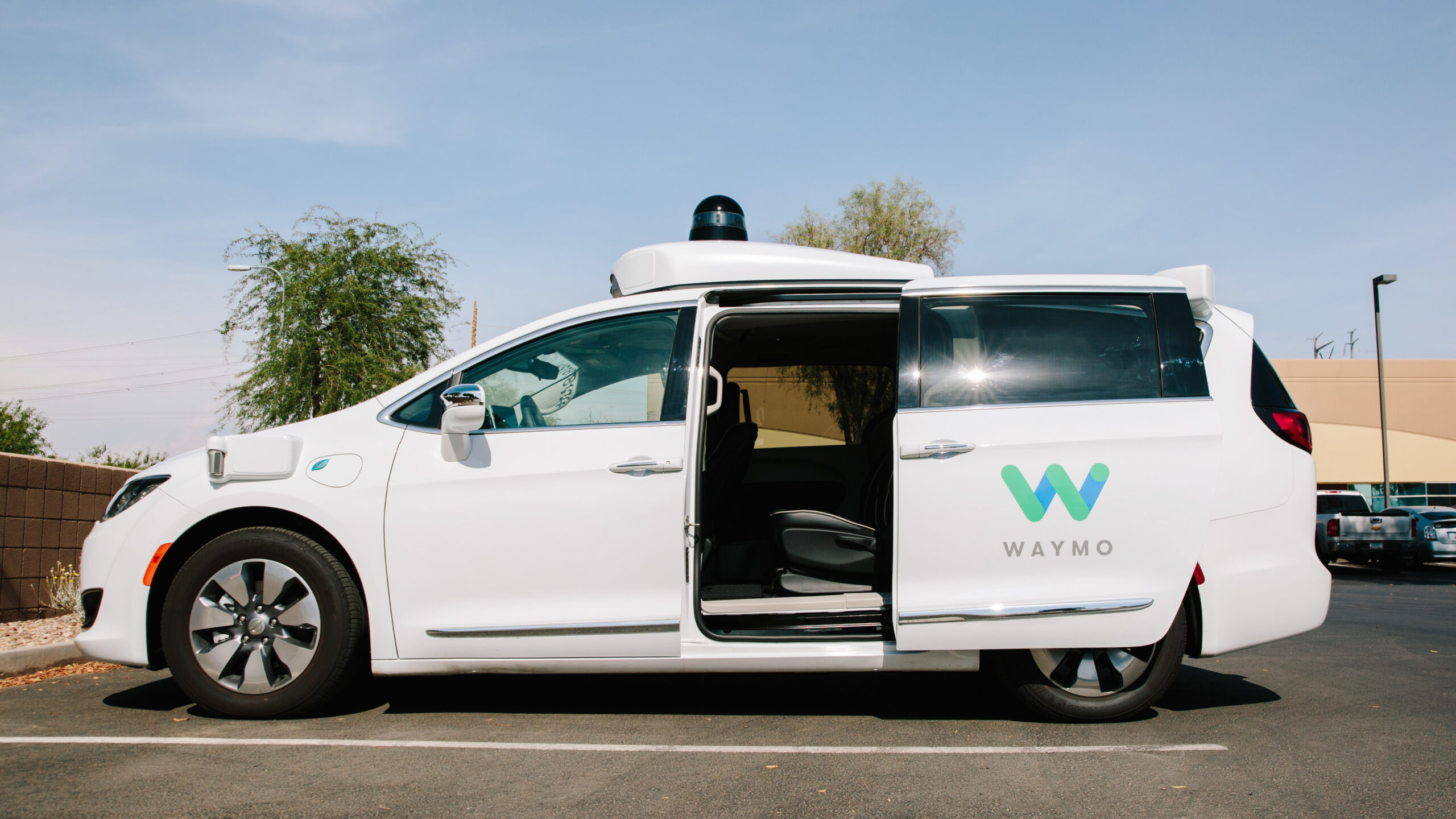 gettyimages-1008465250 A self-driving Waymo Chrysler Pacifica in Chandler, Ariz., in July. The Department of Transportation says it wants to remove barriers to innovation in autonomous car technology.